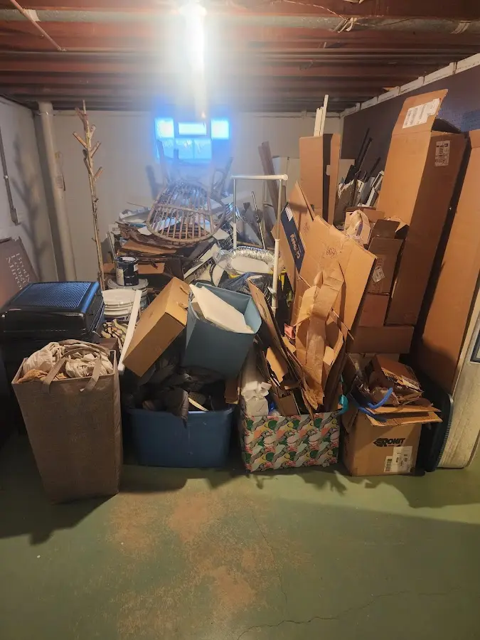 Roll-off dumpster container at job site for 20 Yard Dumpster Rental in Granby